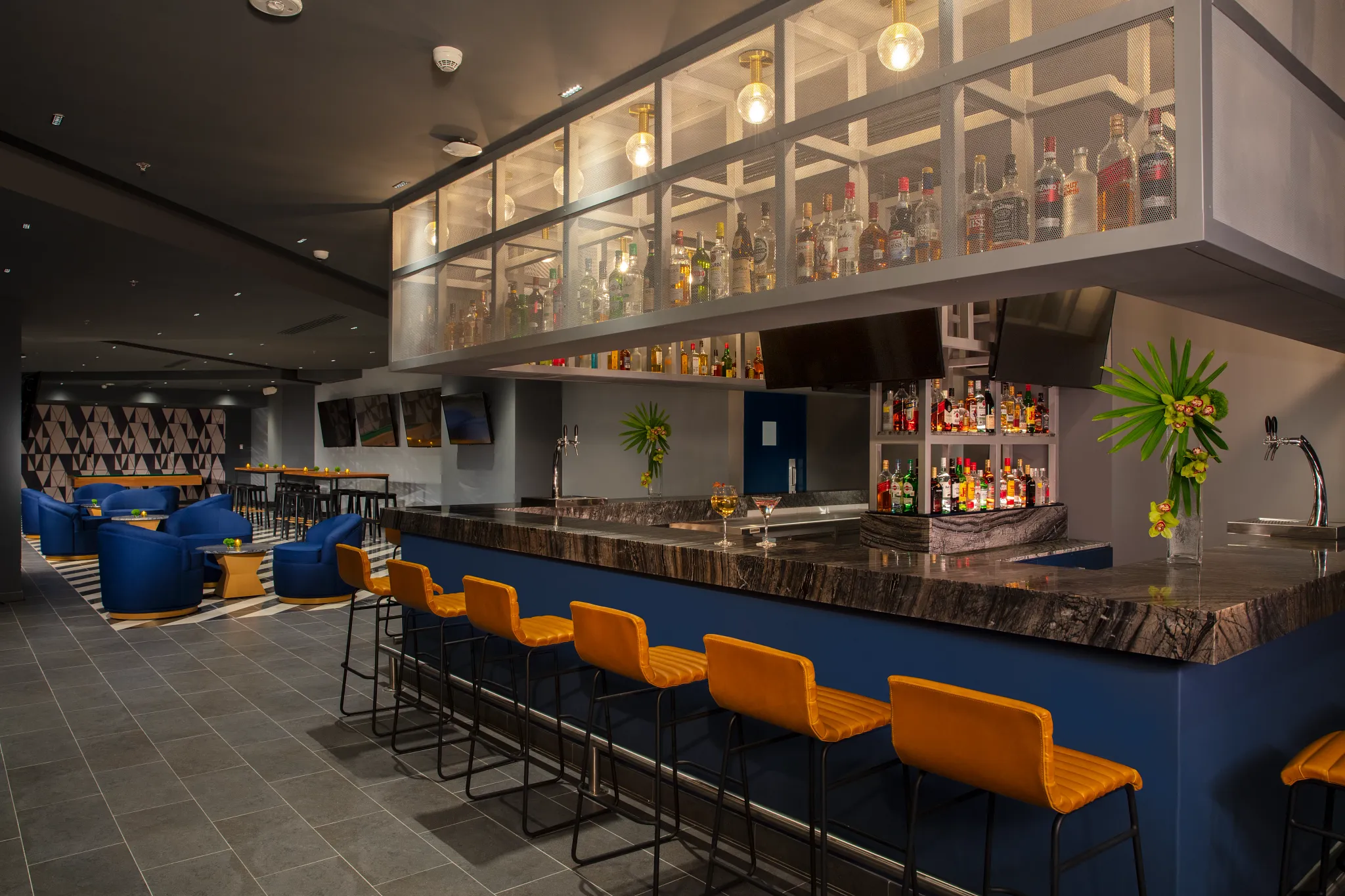 Desires sports and disco bar at Dreams Natura Resort & Spa featuring lively nightlife, dance floor, and casual lounge atmosphere.