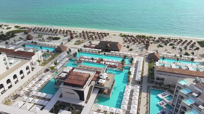 Excellence Playa Mujeres luxury adults-only all-inclusive resort in Playa Mujeres with pristine beach, elegant pools, and upscale dining.