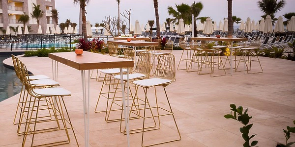 Fishpond Terrace wedding reception setup with water feature at Dreams Natura Resort & Spa