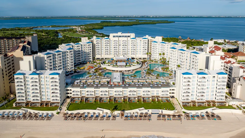 Hilton Cancun All-Inclusive Resort modern beachfront property in Cancun Hotel Zone with pools, ocean views, and upscale amenities.