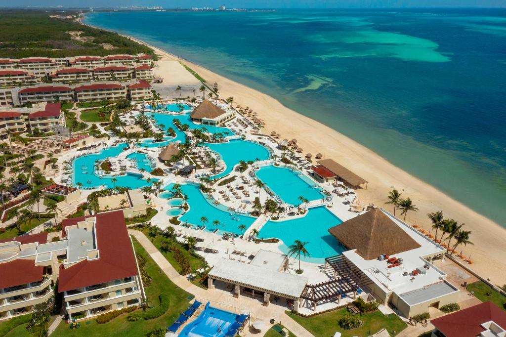 Moon Palace Cancun mega all-inclusive resort with expansive pools, golf course, water park, and endless entertainment options for families.