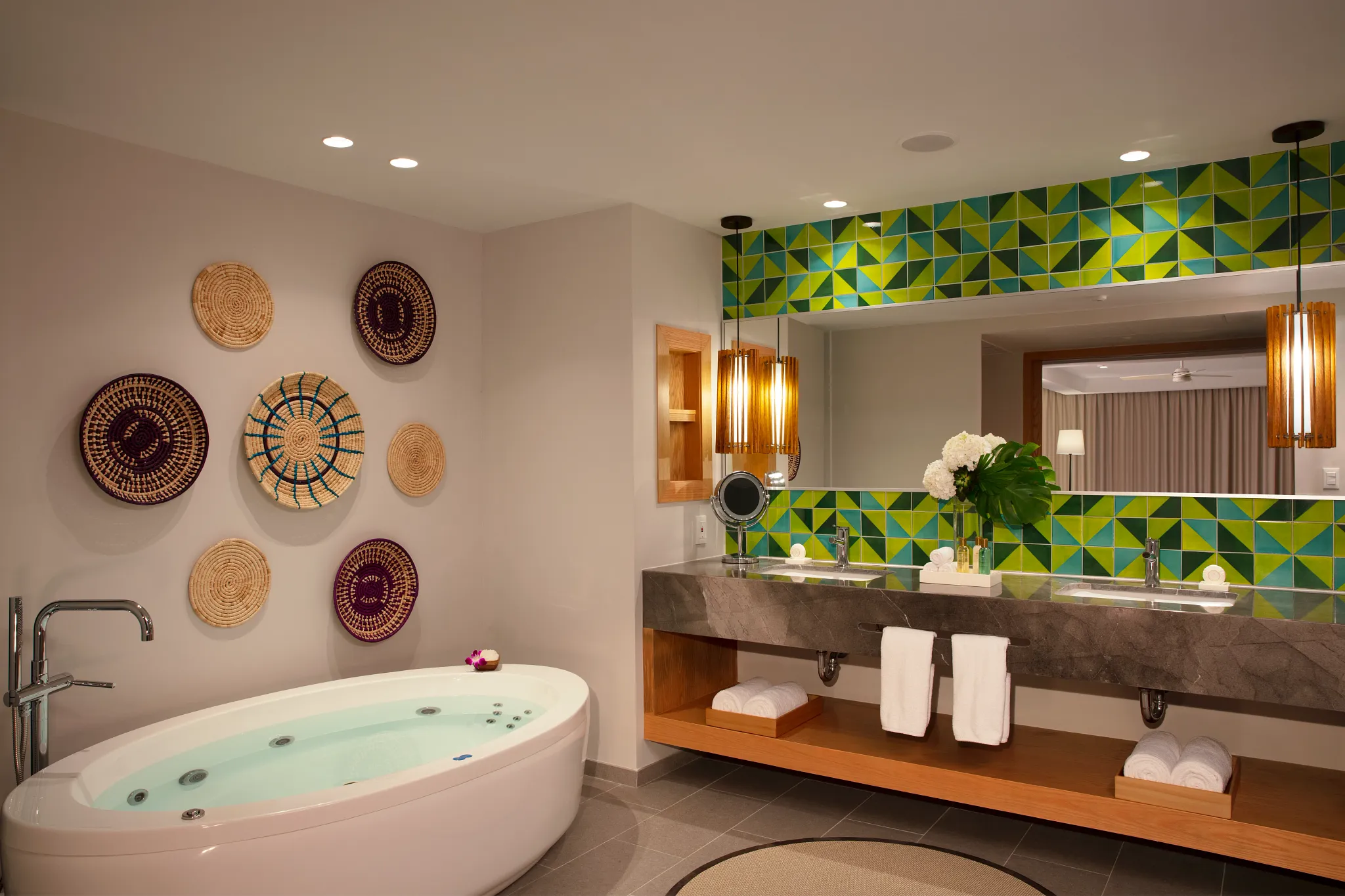 Preferred Club Master Suite Ocean Front bathroom with soaking tub and double vanity at Dreams Natura Resort & Spa.
