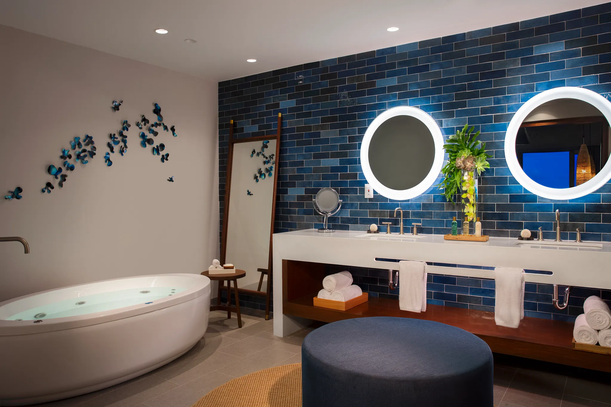 Preferred Club Presidential Suite bathroom with soaking tub and double vanity at Dreams Natura Resort & Spa.