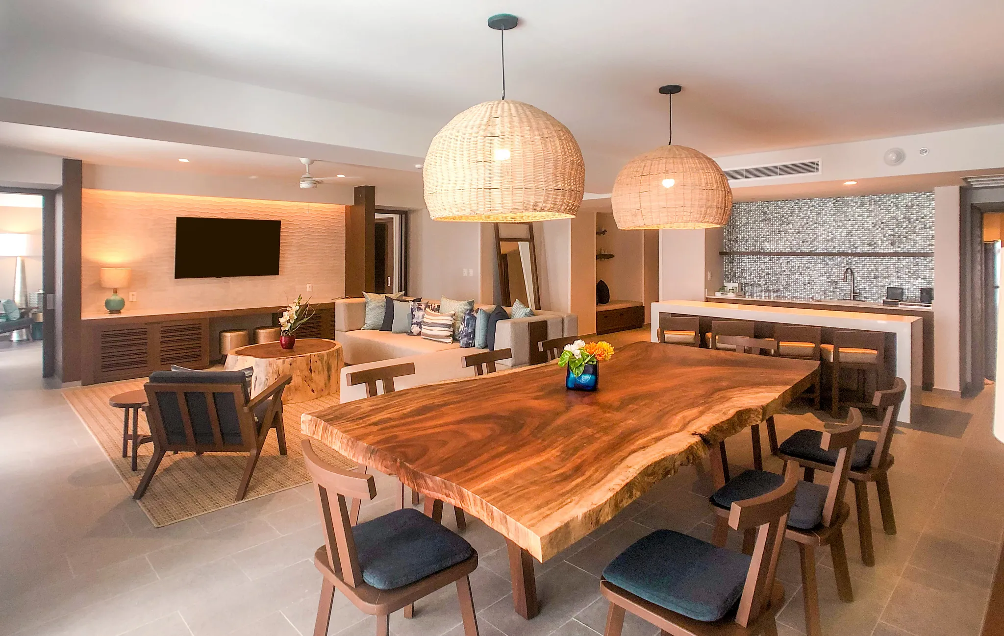 Preferred Club Presidential Suite living area with sofa and ocean view at Dreams Natura Resort & Spa.