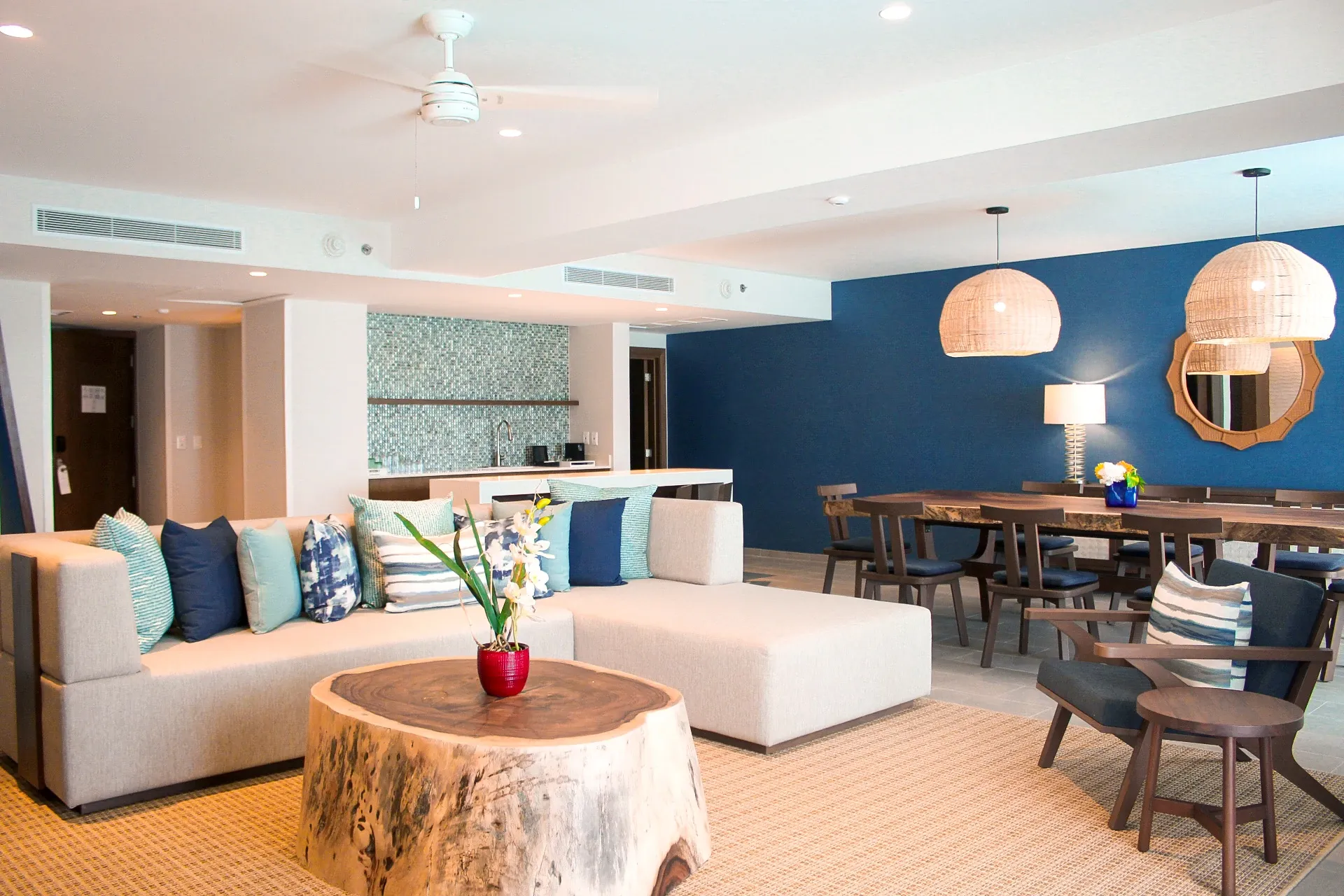 Preferred Club Presidential Suite open living and dining area with modern décor at Dreams Natura Resort & Spa.