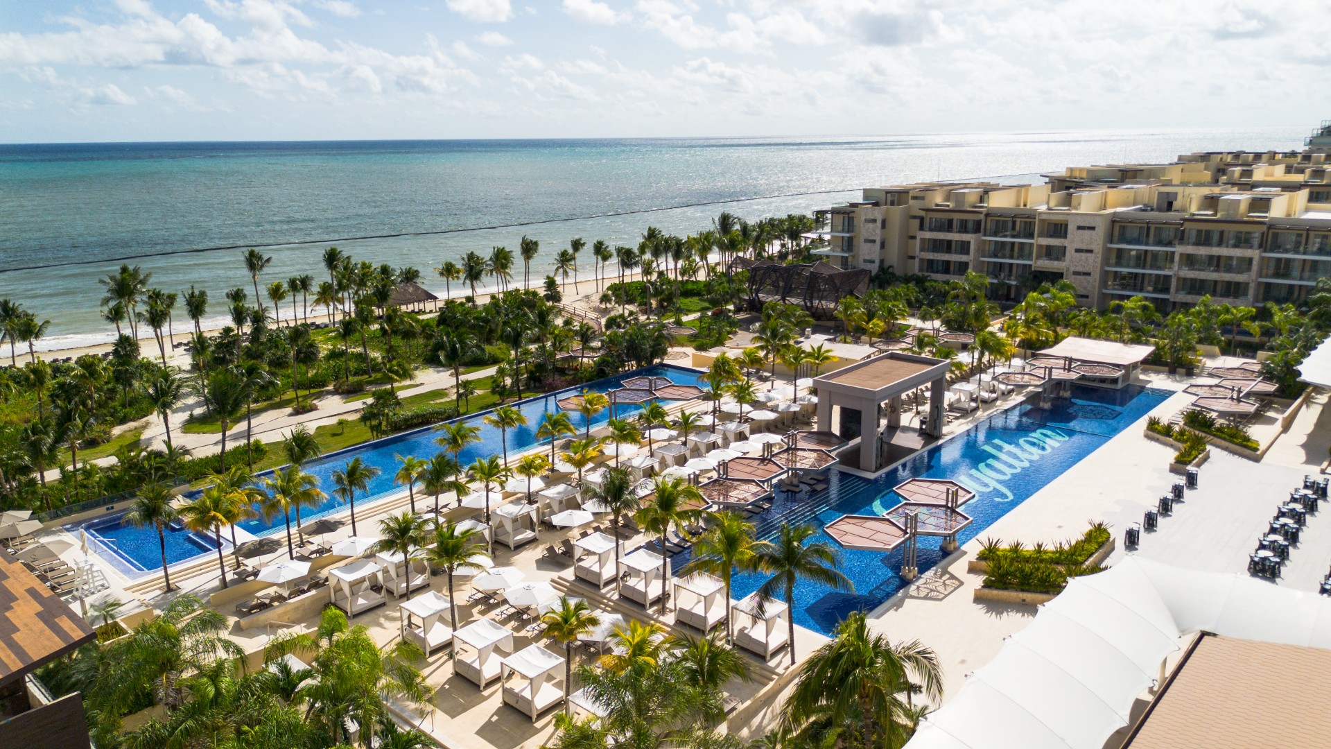 Royalton Riviera Cancun large-scale all-inclusive resort with multiple pools, waterpark, and beachfront location on the Riviera Maya.