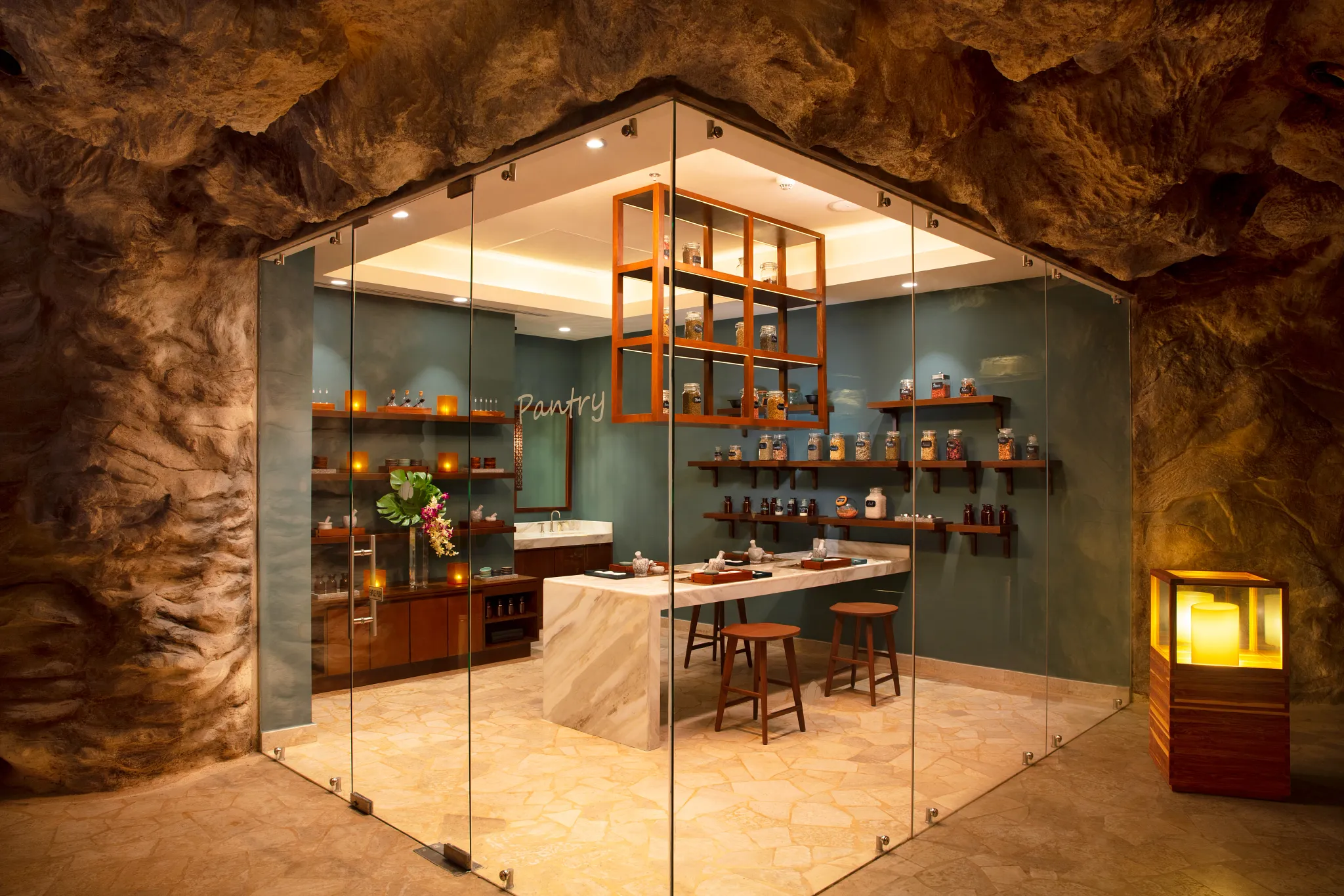 Spa pantry with natural ingredients and treatment stations inside a cave-style setting at Dreams Natura Resort & Spa.